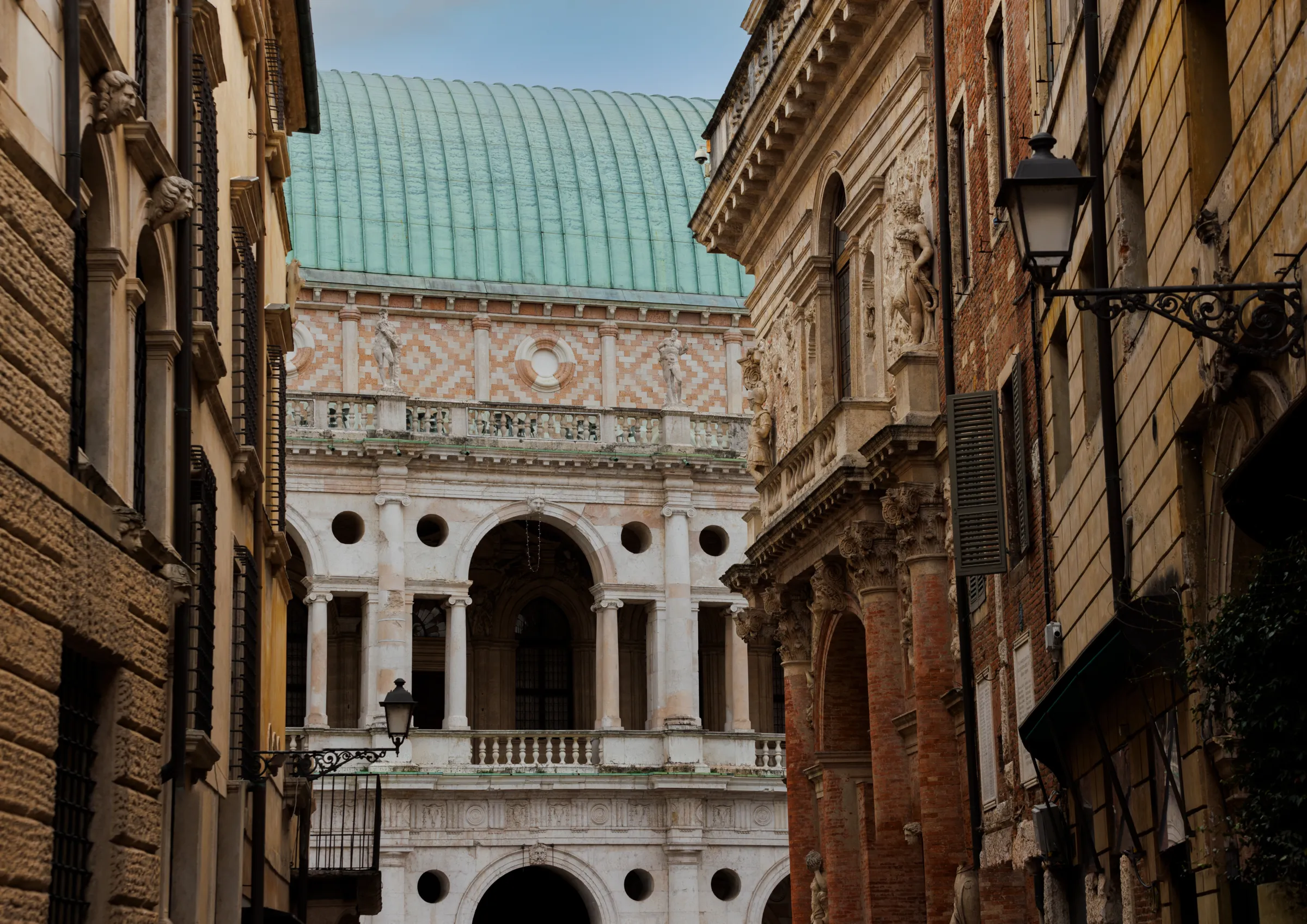 Narrow street in Vicenza opening onto the loggias of Palladio's Basilica Palladiana